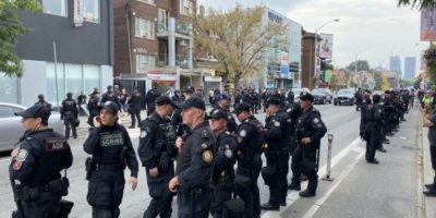Police arrest multiple people at opposing immigration demonstrations in Toronto
