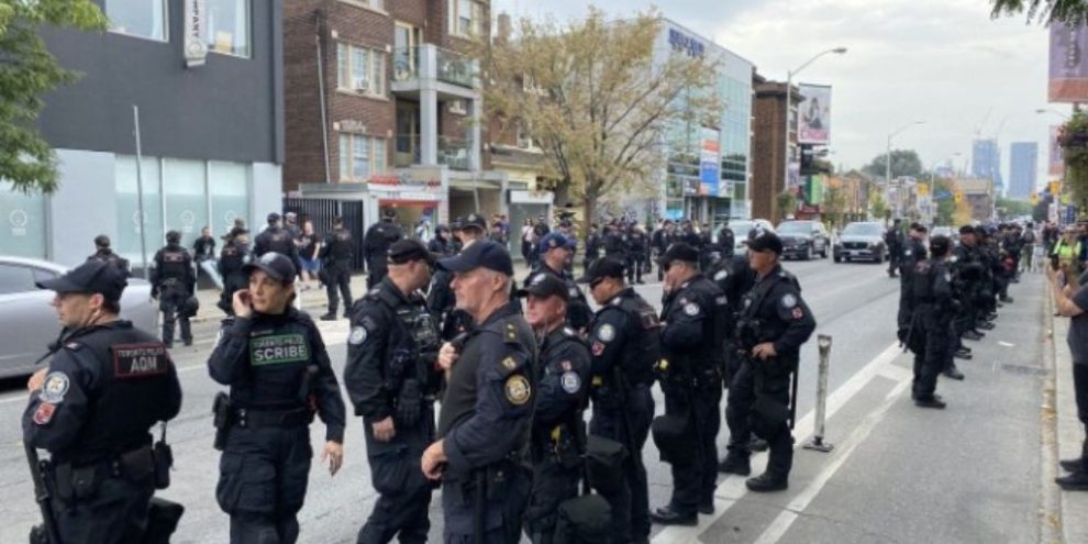 Police arrest multiple people at opposing immigration demonstrations in Toronto