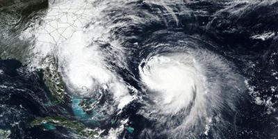 Bermuda lashed by distant hurricane and prepares for the stronger Imelda