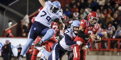 Dedrick Mills rushes for 115 yards, Stampeders trample Argonauts 44-13