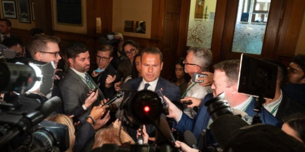 Ford defends system of skills development funding, won't axe minister under fire