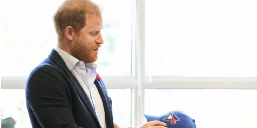 Prince Harry jokes he was 'under duress' while wearing Dodgers cap at World Series