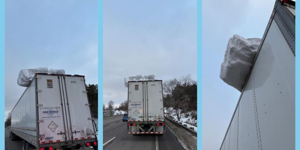 OPP charge trucker after large block of snow and ice on trailer roof