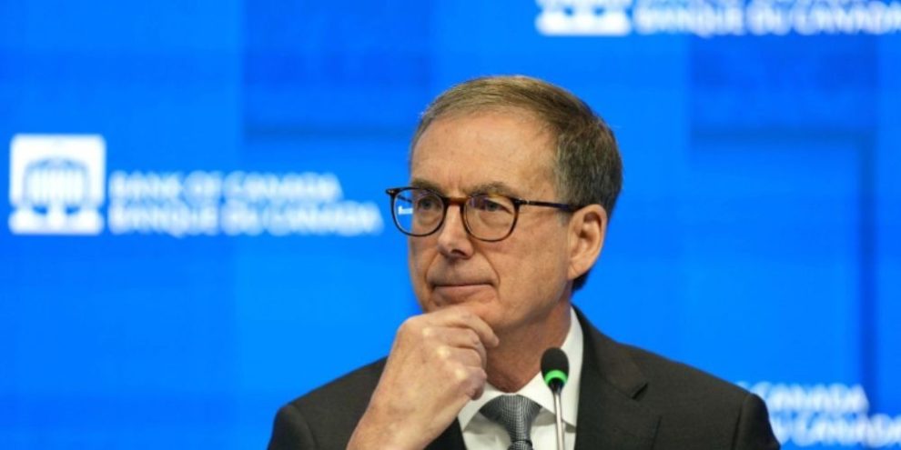 Bank of Canada Governor Tiff Macklem answering questions at a news conference in Ottawa, December 10, 2025, following an interest rate announcement.