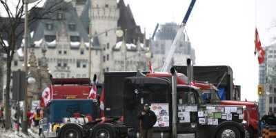 Trucks block streets near the Chateau Laurier hotel in Ottawa during the 2022 Freedom Convoy protest