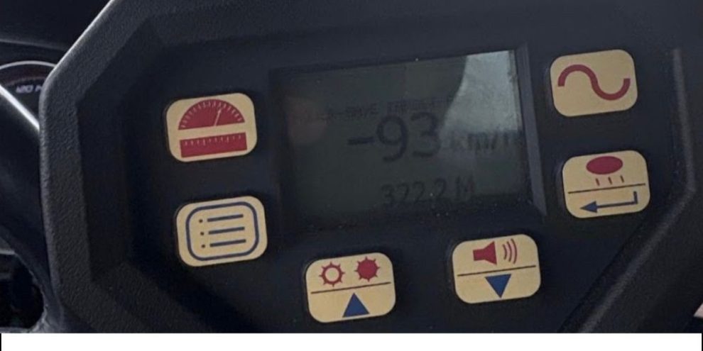 Police speed monitoring device displaying a motorist’s speed reading during traffic enforcement