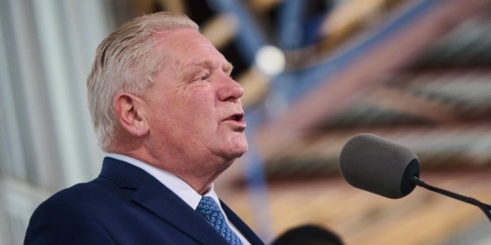 Ontario Premier Doug Ford speaking to reporters at a media availability in Toronto.