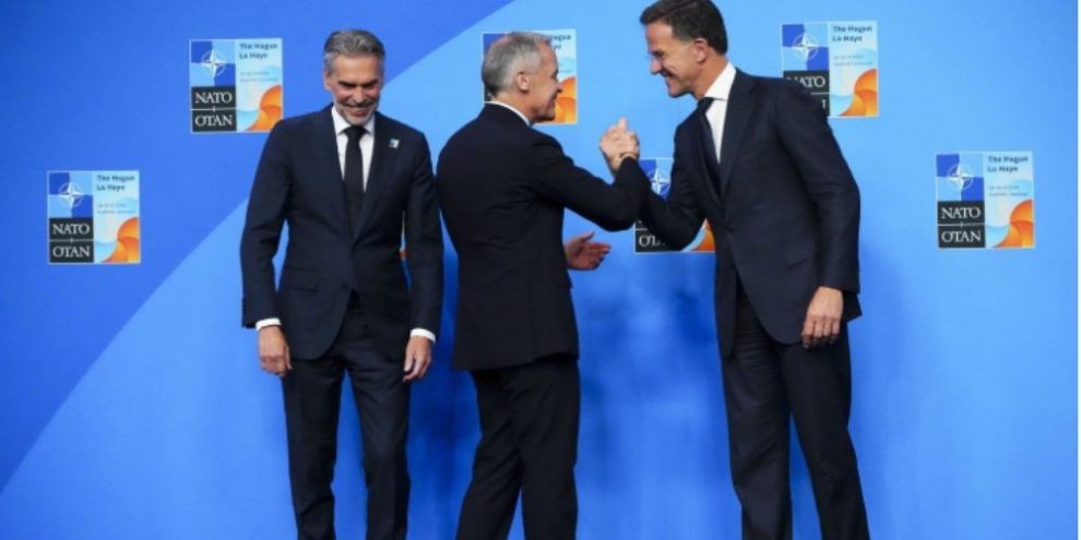 Canadian Prime Minister Mark Carney greeted by NATO Secretary-General Mark Rutte at NATO Summit in The Hague, Netherlands, June 25, 2025.