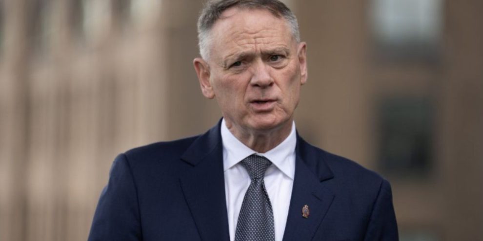 Canadian Defence Minister David McGuinty speaking with reporters in Australia