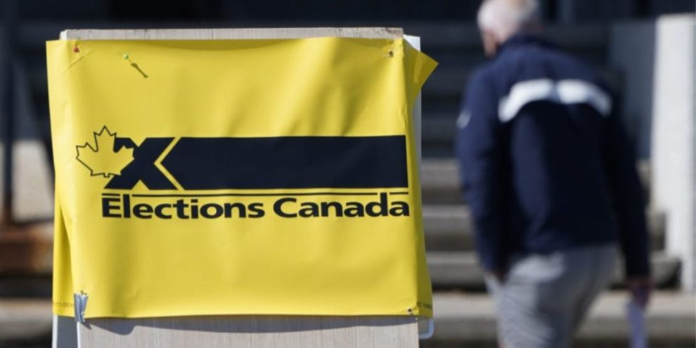 A man enters an advance polling station in Ottawa on Sept. 10, 2021.