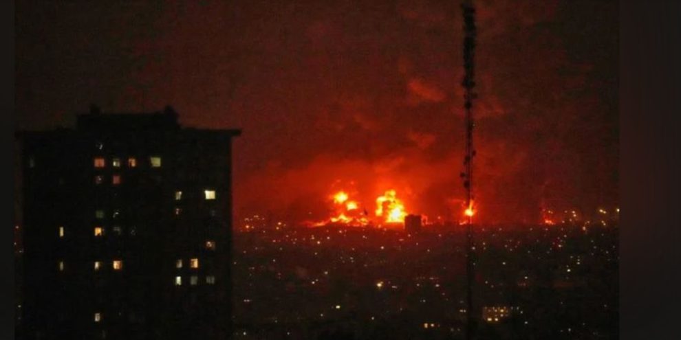 Flames rise from an oil storage facility south of Tehran after U.S. and Israeli airstrikes during the war with Iran.