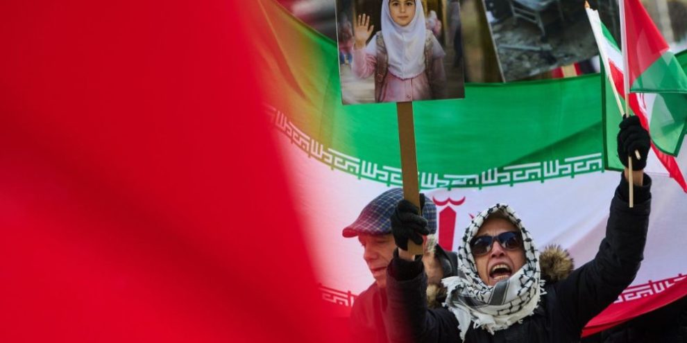 Pro-Palestinian demonstrators wave Palestinian flags outside the U.S. Consulate during the Al-Quds Day rally in Toronto on March 14, 2026.