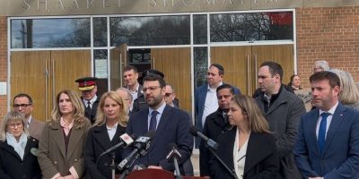 Community leaders and officials hold a news conference outside Shaarei Shomayim synagogue in Toronto following weekend gunfire incidents.