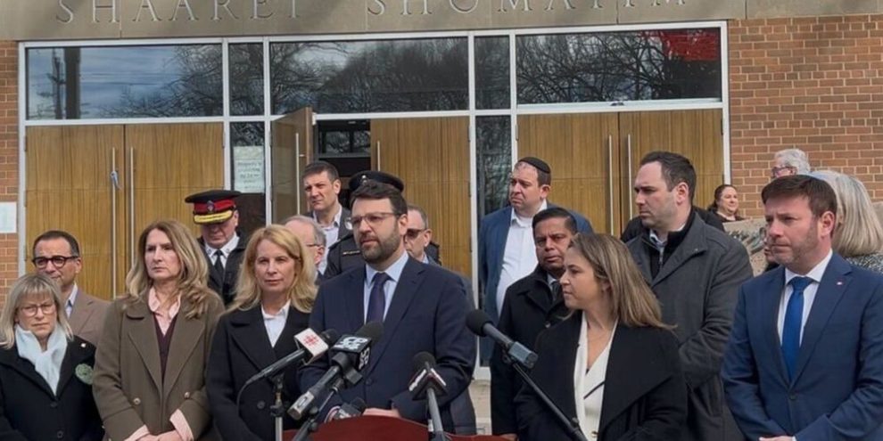 Community leaders and officials hold a news conference outside Shaarei Shomayim synagogue in Toronto following weekend gunfire incidents.