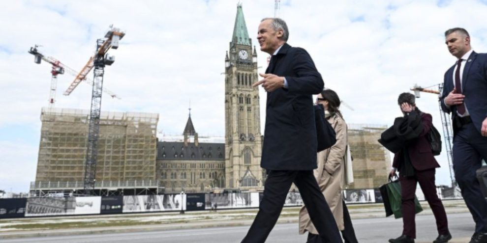 Mark Carney walking toward West Block on Parliament Hill
