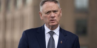 David McGuinty speaks with reporters during a media availability in Sydney.