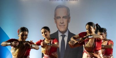 Dancers perform as Prime Minister Mark Carney arrives in New Delhi, India, on March 1, 2026.
