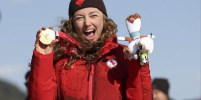 Natalie Wilkie receives her gold medal for the 12.5-km individual biathlon at the 2026 Winter Paralympic Games in Val di Fiemme, Italy.