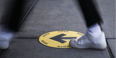 Sign directing voters to a polling station during a federal election in Calgary.