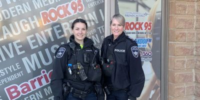 Barrie police Constable Taylor Collins and Staff Sgt. Angie Butler discuss traffic safety measures on February 17, 2026.