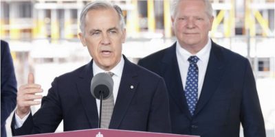 Prime Minister Mark Carney speaking at housing announcement in Toronto