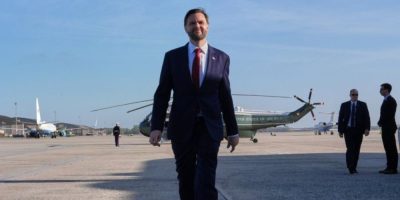 U.S. Vice President JD Vance speaks with reporters before boarding Air Force Two at Joint Base Andrews en route to Pakistan for Iran negotiations.