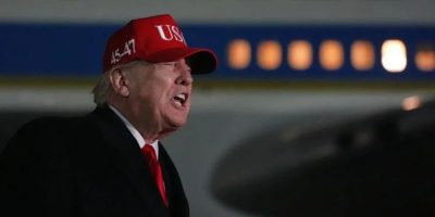 U.S. President Donald Trump speaks with reporters at Joint Base Andrews after returning from Miami on April 12, 2026.
