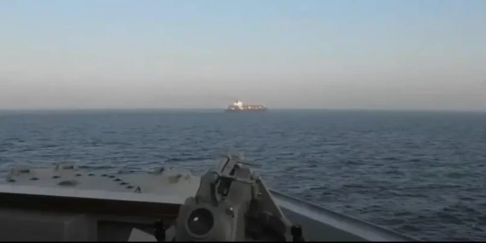 U.S. forces seize an Iranian-flagged cargo ship near the Strait of Hormuz during a naval blockade operation as tensions rise with Iran