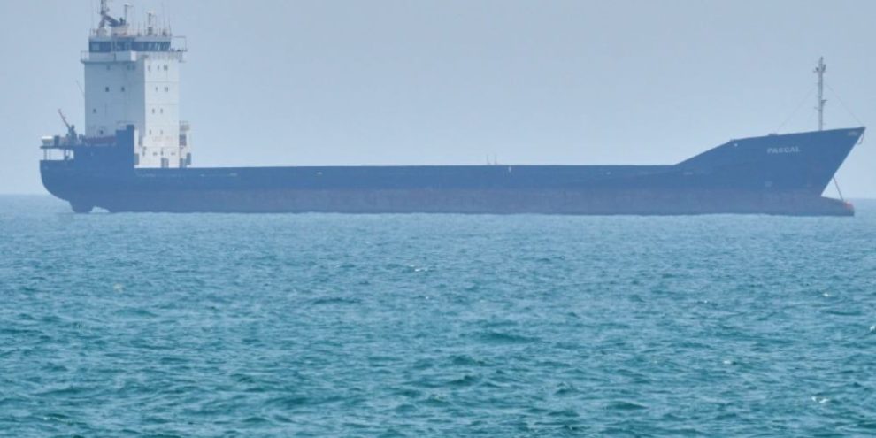 A tanker sits anchored in the Strait of Hormuz off the coast of Qeshm Island, Iran, on April 18, 2026.