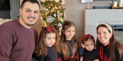 Andrew Cristillo pictured with his wife and three daughters in a family photo provided by Jordan Cristillo following his death in a 2025 crash.