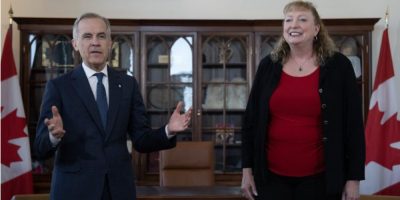 Prime Minister Mark Carney addressing the media on Liberal caucus values and floor-crossing MPs