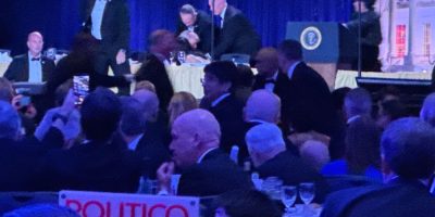Secret service agents respond during the White House Correspondents Dinner, Saturday, April 25, 2026, in Washington. (AP Photo/Mark Schiefelbein)
