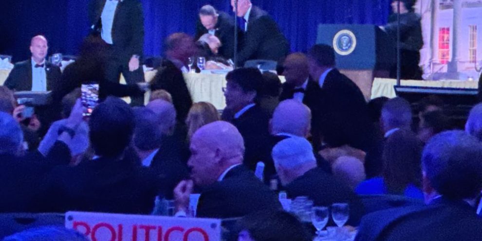 Secret service agents respond during the White House Correspondents Dinner, Saturday, April 25, 2026, in Washington. (AP Photo/Mark Schiefelbein)