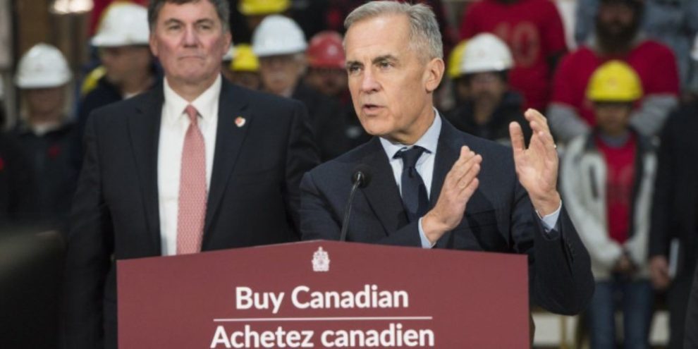Prime Minister Mark Carney speaks during an announcement at a manufacturing facility in Fredericton, New Brunswick.