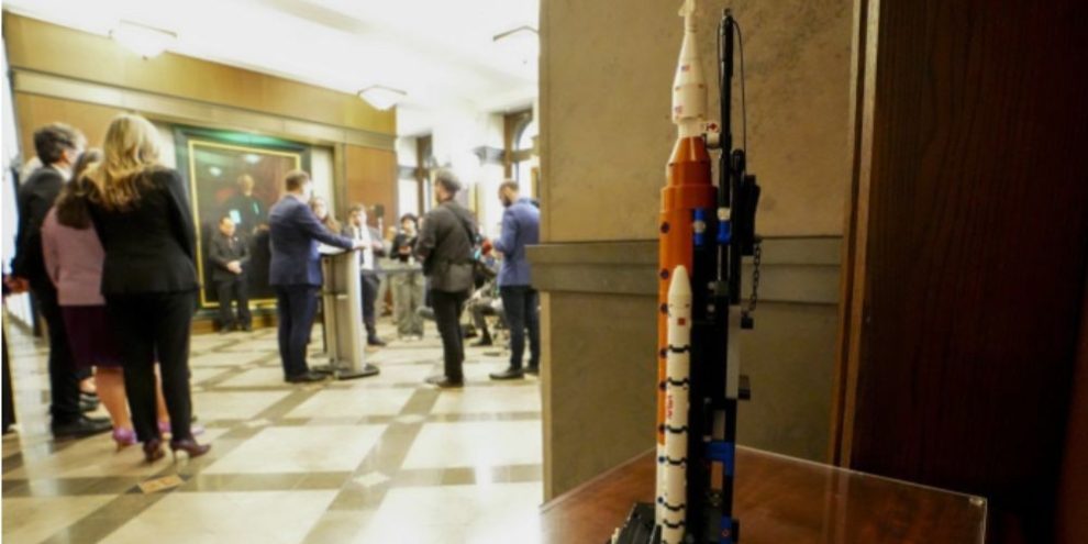 Transport Minister Steven MacKinnon speaks at a press conference in Ottawa beside a Lego model of an Artemis rocket following the introduction of space launch legislation.