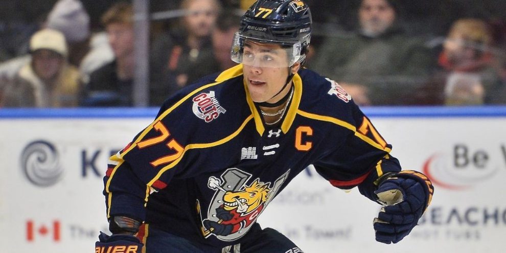 Barrie Colts defenceman Kashawn Aitcheson recognized as OHL Defenceman of the Year, celebrating his Max Kaminsky Trophy win.