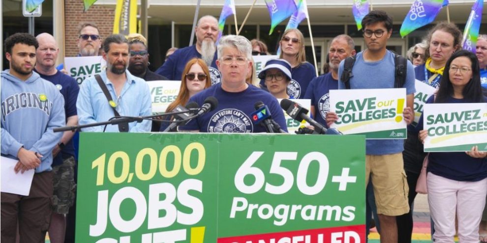 JP Hornick stands with supporters outside Centennial College in Toronto during a July 2025 event