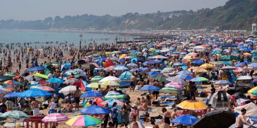 Parts of Europe swelter in record May heat as deaths at amateur sports events spur warnings