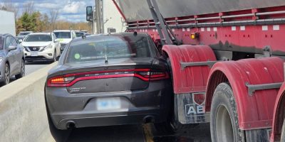 Ontario Provincial Police cruiser and dump truck involved in a collision on Highway 400 northbound near County Road 88 in Bradford West Gwillimbury.