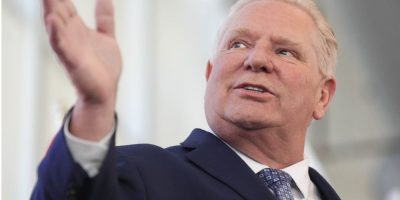 Ontario Premier Doug Ford speaking at a Toronto press conference as reports detail $200K in costs tied to a reversed Bombardier Challenger 650 jet purchase.