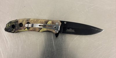 Police tape in Barrie’s north end near a park and nearby plaza connected to alleged knife threats and theft incidents.