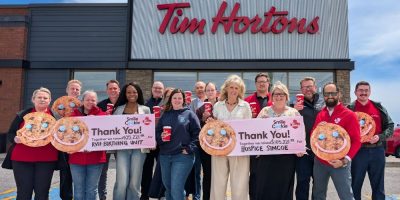 Representatives from RVH, Hospice Simcoe – Seasons Centre, and Barrie Tim Hortons owners celebrate raising more than $210,000 through the Smile Cookie campaign for local health care and hospice services.