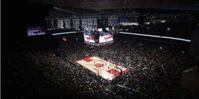 Fans watch the Toronto Raptors play the Philadelphia 76ers during an NBA playoff game in Toronto in April 2022