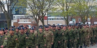 Canadian Forces Base Borden personnel marching in Barrie’s Freedom of the City Parade along Collier Street during 110th anniversary ceremony.
