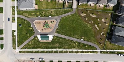 Gateway Park in Barrie featuring playground equipment and shade structure at new neighbourhood park