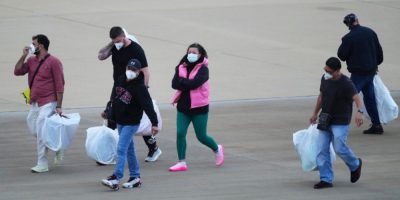 Passengers evacuated from the MV Hondius cruise arrive at an airport in the Netherlands after a hantavirus outbreak on board.