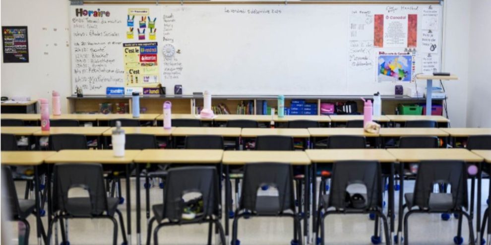 Empty classroom with student desks and chairs at Wazoson Public School in Ottawa-Carleton District School Board, Ottawa, showing a typical Ontario elementary school learning environment.