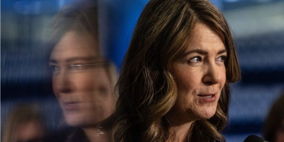 Alberta Premier Danielle Smith speaks at a podium during an announcement in Edmonton as debate grows over a proposed referendum tied to Alberta separation from Canada.