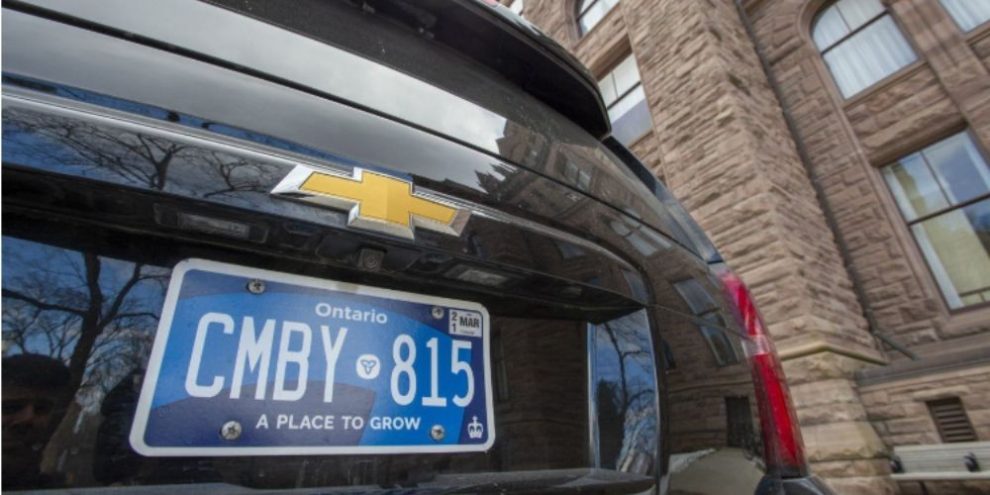One of Premier Doug Ford's vehicles is parked outside the Ontario legislature in Toronto displaying a blue licence plate in February 2020.