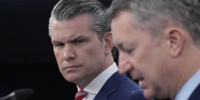 U.S. Defense Secretary Pete Hegseth and Gen. Dan Caine speak during a Pentagon press briefing in Washington, May 5, 2026.